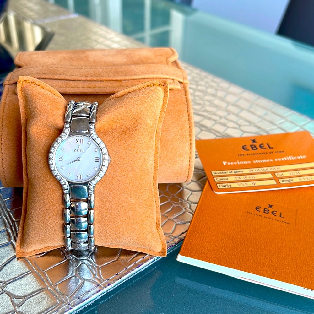 Ebel Beluga watch w/ mother of pearl face and 28 diamonds around & on face.